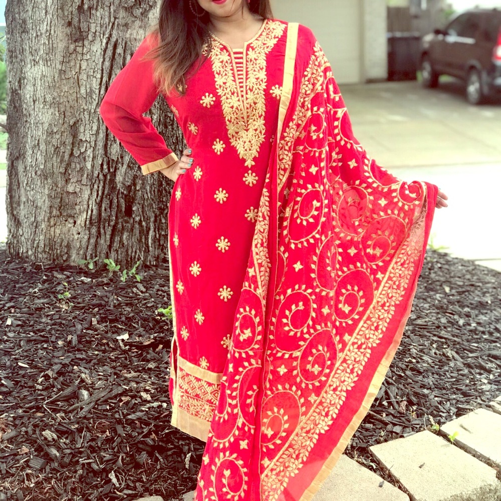 Red georgette embroidered chureedar three piece.